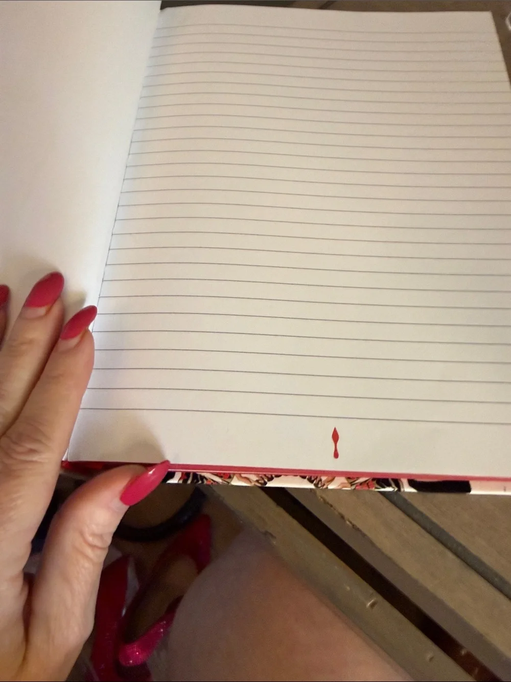Christian Louboutin White Notebook with Red, Orange, Brown, and Black Accents